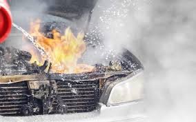 Car engine fire under the hood
