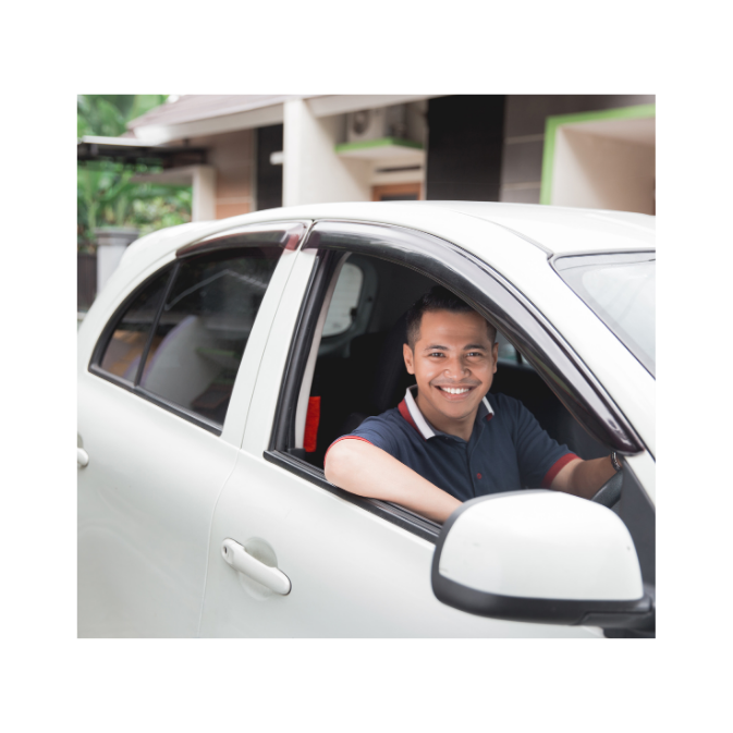 Confident driver navigating a city road
