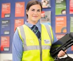 Driving test examiner assessing a learner driver